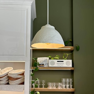 Unique pendant paper mache light for kitchen island