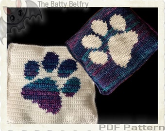May include: Two crocheted pillow covers with a paw print design. The paw print on the left is a multi-colored design on a white background. The paw print on the right is white on a multi-colored background. The text "The Batty Belfry" and "PDF Pattern" are visible in the image.