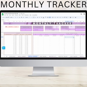 May include: A computer screen displaying a spreadsheet with a monthly tracker for a small business. The spreadsheet includes columns for income, expenses, and net profit. The spreadsheet is titled "Monthly Tracker".