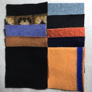 May include: A collection of fabric swatches in various colors and textures, including black, brown, blue, orange, and purple. The swatches are arranged in a grid pattern.
