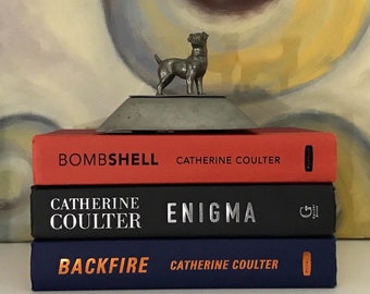 Set of Catherine Coulter decorative books, perfect for staging, books by color, bookshelf + office decor/display, books by the foot.