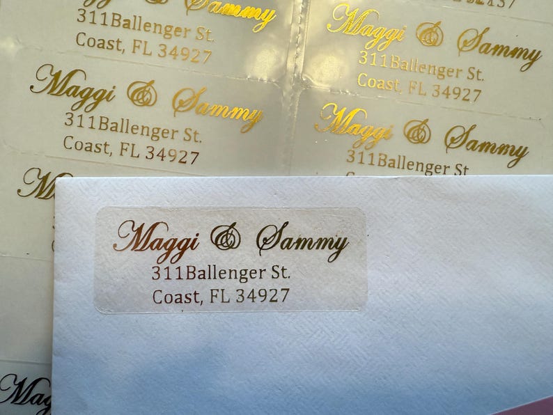 May include: Gold foil return address labels with the names "Maggi & Sammy" and the address "311 Ballenger St. Coast, FL 34927".