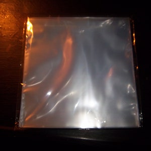 FREE SHIPPING!!! 1 Record PLUS 50ct 12&quot; Plastic Outer Jackets For Vinyl Records Album Lp