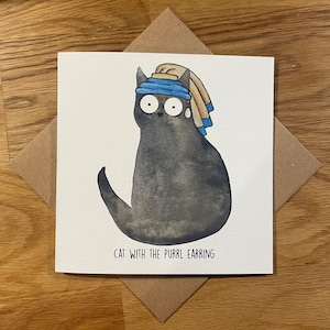 Carte d'anniversaire drôle de chat, carte drôle de chat, chat avec la boucle d'oreille de ronronnement.