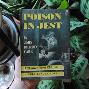 May include: A vintage paperback book titled "Poison in Jest" by John Dickson Carr. The cover features a black and white illustration of a doctor examining a patient. The book is a thriller novel classic and a full-length novel.