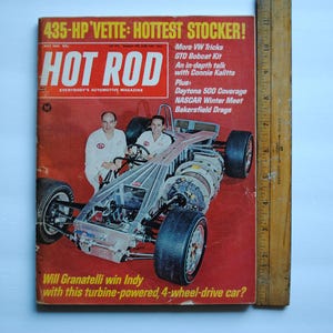 May include: A vintage Hot Rod magazine cover featuring a red, white, and blue race car with a turbine engine. The cover text reads "435-HP Vette: Hottest Stocker!" and "Will Granatelli win Indy with this turbine-powered, 4-wheel-drive car?"