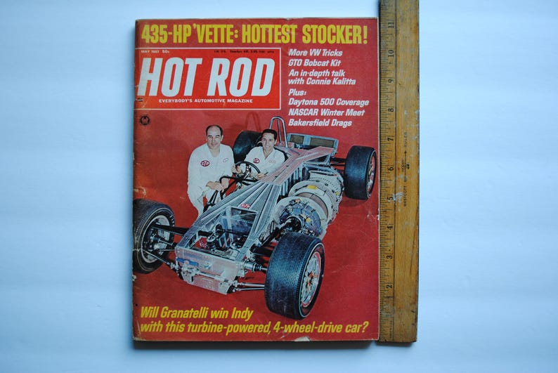 May include: A vintage Hot Rod magazine cover featuring a red, white, and blue race car with a turbine engine. The cover text reads "435-HP Vette: Hottest Stocker!" and "Will Granatelli win Indy with this turbine-powered, 4-wheel-drive car?"