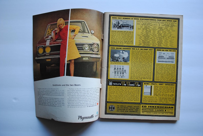 May include: A vintage magazine ad for Plymouth cars featuring a woman in a red and yellow dress standing next to a red and white Plymouth car. The ad text reads "Goldilocks and the two Bears". The magazine also features an ad for Ed Iskenderian Racing Cams.