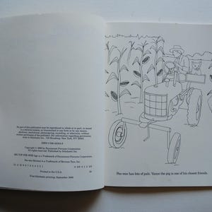 May include: A black and white illustration of a tractor driving through a field of corn. The tractor has a driver and a pig in the back. The text "Phe-wee has lots of pals. Vince the pig is one of his closest friends." is at the bottom of the page.