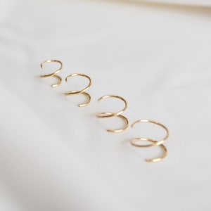 four tiny twist earrings in 14k gold fill