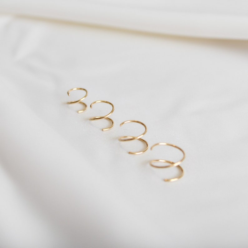 four tiny twist earrings in 14k gold fill