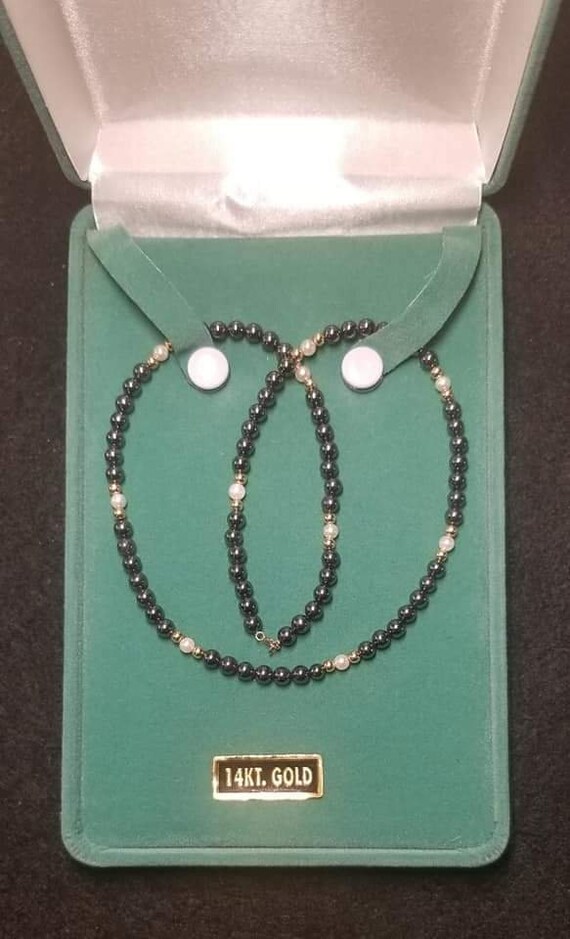 Vintage black beads gold Gem