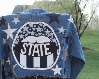 jean jacket with lips on the back