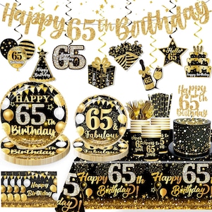May include: A collection of black and gold 65th birthday party decorations. Includes plates, cups, a cake, a banner, and other festive items. The decorations feature the text "Happy 65th Birthday" and "65 & Fabulous."