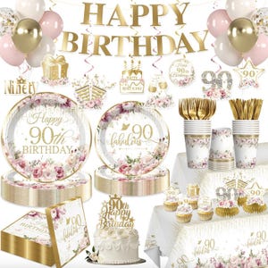 May include: A 90th birthday party supply set featuring gold and pink floral designs. Includes Happy Birthday banners, balloons, plates with 90th Birthday and 90 fabulous text, napkins, cups, gold cutlery, a cake topper, and a tablecloth with floral accents.