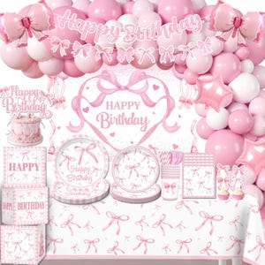 May include: A pink and white birthday party decoration set. The set includes balloons, a banner that says "Happy Birthday", plates, cups, napkins, and a tablecloth, all with a pink bow design. There is also a cake and gift boxes.