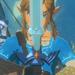 May include: A character from the Legend of Zelda video game series holds the Master Sword. The sword is light blue with a gold and blue hilt. The character wears a blue tunic and has long, light brown hair and pointed ears.