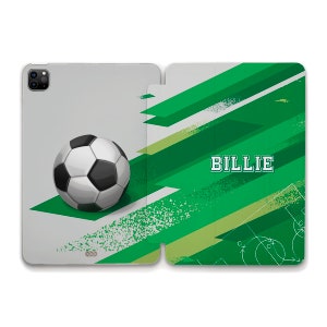 May include: A white and green phone case with a soccer ball and the name "Billie" printed on it.