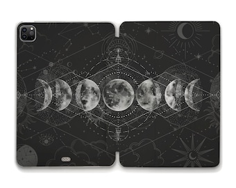 May include: A black phone case with a white moon phases design. The design includes a crescent moon, half moon, full moon, and other moon phases. The background is black with white stars and other celestial designs.