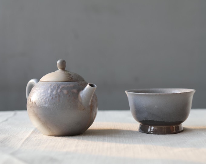 130ml / 4.4 fl oz Jingdezhen Wood-Fired "Dragon Egg (Longdan)" Teapot Set, including 1 teapot and 1 tea cup.