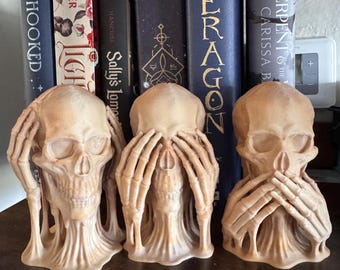 Conjunto de calaveras "No oigo, no veo, no hablo, no es maldad"