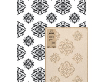 May include: A stencil sheet with a brown background and six cut-out mandala designs. The sheet is labeled "NAKLEO Seamless Collection".