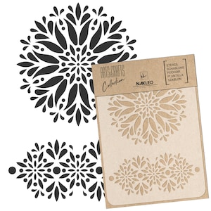 May include: A stencil set with floral patterns. The set includes a stencil with cut-out designs and a black and white floral design. The packaging reads "ARTS & CRAFTS Collection" and "NAKLEO ART & WALL DECOR".