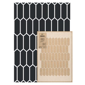 May include: Black and white geometric pattern with elongated hexagon shapes. A cardboard stencil with a similar design is displayed next to the pattern. The stencil has the text "NAKLEO Seamless Collection".