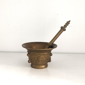Vintage Bronze Apothecary Mortar and Pestle: Ornate Feminine Heads Decor