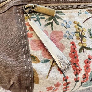 Srebrny uchwyt do zamka/breloczka do sztućców – wiosenny urok, srebro (1950)