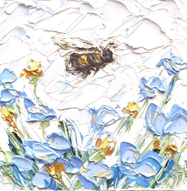 May include: A painting of a bee flying over a field of blue irises with yellow centers. The painting is done in a textured style with thick brushstrokes.