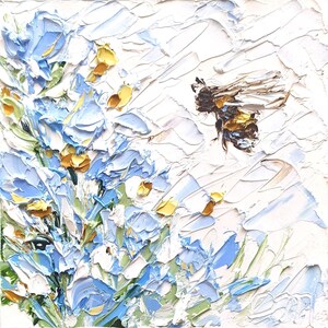 May include: A painting of a bee flying near a cluster of blue and white flowers with yellow centers. The flowers are painted with thick, textured strokes of paint, giving the painting a three-dimensional effect.