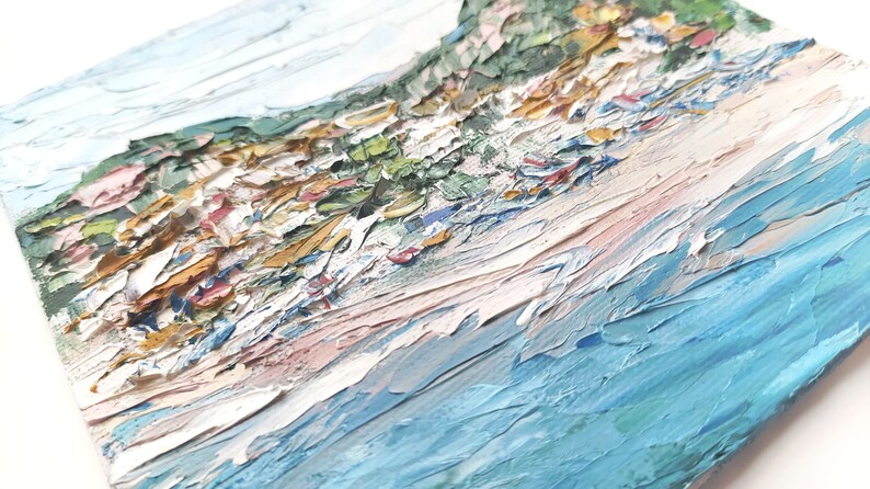 May include: A textured oil painting of a seascape with a green and brown hillside in the background and blue water in the foreground.