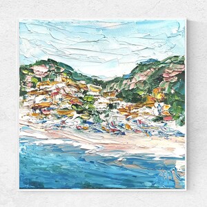 May include: A painting of a coastal town with colorful buildings on a hillside overlooking a blue ocean. The painting is done in a loose, impressionistic style with thick brushstrokes.