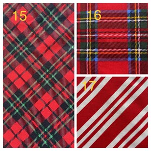 May include: Three fabric swatches with numbers 15, 16, and 17. The first swatch is a red and black plaid pattern. The second swatch is a red, green, blue, and yellow plaid pattern. The third swatch is a red and white striped pattern.