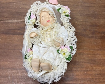 Vintage Porcelain Baby Doll in Bassinet Wicker Crib