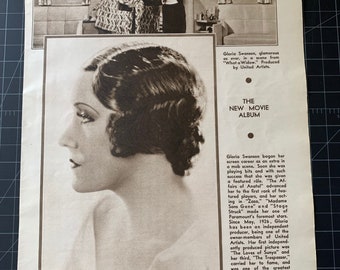 May include: A black and white photo of Gloria Swanson, a famous actress, from the 1920s. The photo is from a magazine article about her career. The text in the article reads "The New Movie Album" and "Gloria Swanson".