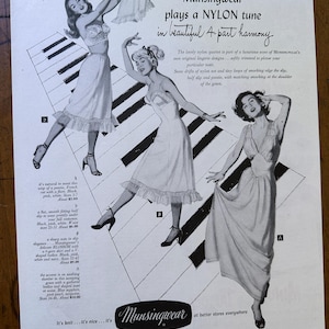 May include: Vintage advertisement from Ladies' Home Journal featuring Munsingwear lingerie. The black and white image showcases three women in nylon slips and a piano keyboard design. Text includes "Munsingwear plays a NYLON tune."