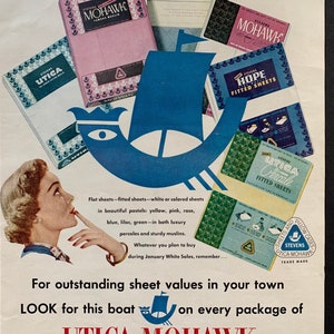 May include: Vintage advertisement for Utica-Mohawk sheets. The ad features a blue boat graphic and various boxes of sheets in pastel colors. Text includes "Beauticale," "Hope Fitted Sheets," and "Fine Fabrics Since 1813."