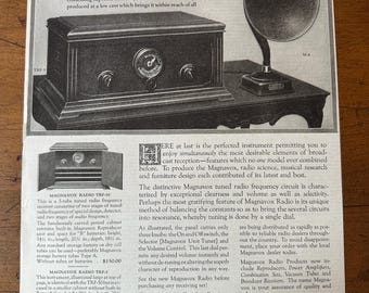May include: An advertisement from The Saturday Evening Post for Magnavox Radio, featuring a vintage radio receiver and a separate speaker. The text highlights the radio's features and the company's locations.