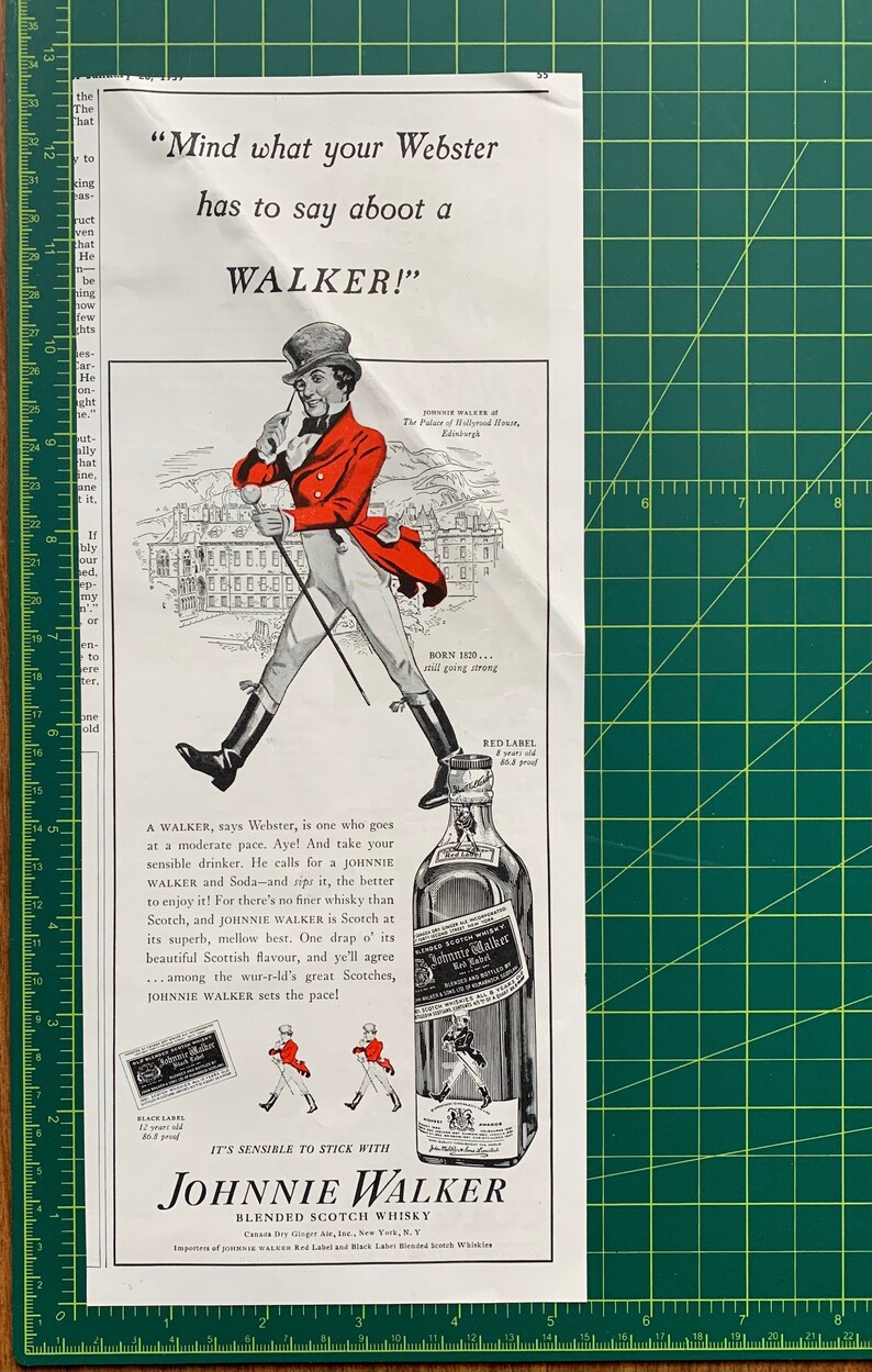 May include: A vintage advertisement for Johnnie Walker blended Scotch whisky. The ad features a man in a red hunting jacket and black riding boots walking with a stick. The text reads "Mind what your Webster has to say about a WALKER!" and "It's sensible to stick with Johnnie Walker Blended Scotch Whisky".