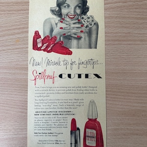 May include: An old advertisement for Cutex nail polish and lipstick. The image shows a woman with red nails and a flower, with red nail polish bottles and lipstick. The text reads "New! Miracle tip for fingertips..." and "Spillpruf CUTEX."