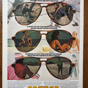 Peut inclure: Publicit&eacute; vintage pour les lunettes de soleil Ray-Ban Ambermatics. L'annonce pr&eacute;sente trois paires de lunettes de soleil avec diff&eacute;rentes teintes, d&eacute;montrant leur capacit&eacute; &agrave; s'adapter &agrave; diverses conditions de lumi&egrave;re. Le texte met en &eacute;vidence les caract&eacute;ristiques et les avantages des lunettes de soleil.