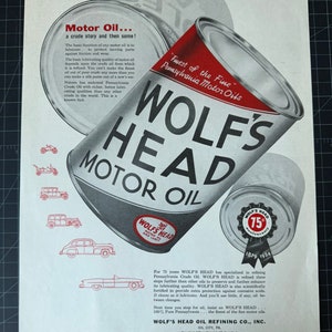 Vintage 1950s wolf’s head motor oil print ad