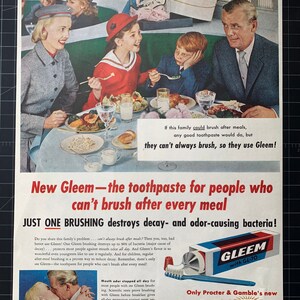 May include: A retro advert for Gleem toothpaste, showing a family dining out. The text highlights the product's advantages. The image also includes a tube of Gleem and a toothbrush.