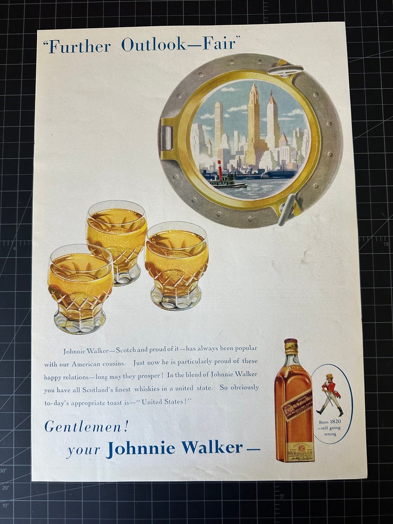 May include: A vintage advertisement for Johnnie Walker Scotch whisky. The ad features a cityscape with tall buildings and a boat in the foreground. The text reads "Further Outlook-Fair" and "Gentlemen! your Johnnie Walker - Born 1820 - still going strong".