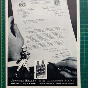 May include: Vintage black and white advertisement for Johnnie Walker Blended Scotch Whisky. The ad features a drawing of a man in a top hat, two bottles of whisky, and a letter. Text includes "Red Label 8 years old" and "Black Label 12".