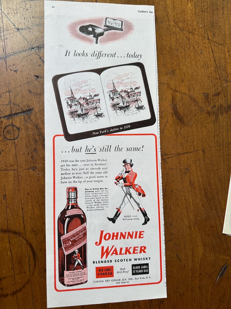 May include: Vintage advertisement for Johnnie Walker Blended Scotch Whisky. The ad features a bottle of Red Label whisky, a drawing of a man in a red coat, and the text "Johnnie Walker". The ad also includes the text "It looks different...today".