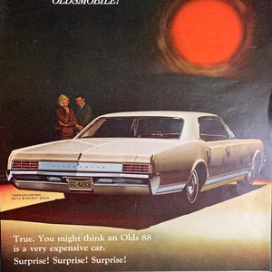 Vintage 1960s Oldsmobile Delta 88 Holiday Sedan Print advertisement