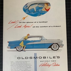 Vintage 1950s oldsmobile holiday sedan print advertisement